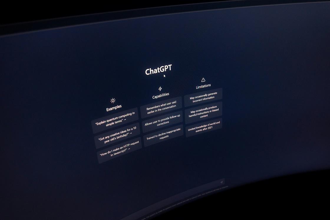 Close-up of a computer screen displaying ChatGPT's capabilities and limitations, including examples of its uses and potential inaccuracies.