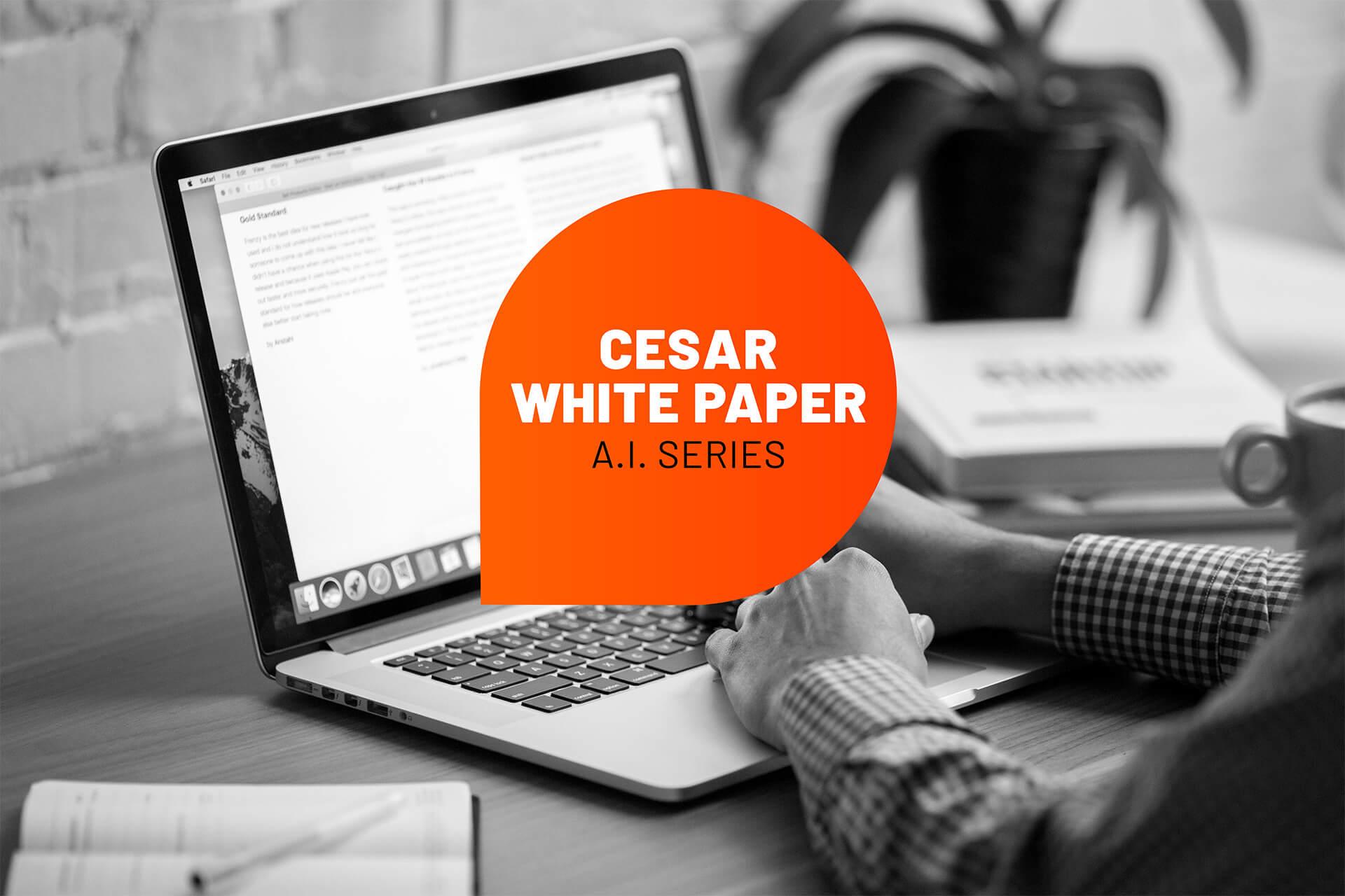 Close-up of hands typing on a laptop displaying a Cesar White Paper, part of an A.I. series.  A bright orange callout highlights the paper's title.