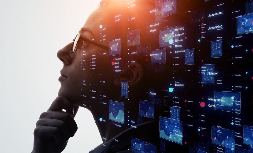 Data-analyst-looking-for-anomalies-in-a-complex-machine-learning-driven-dashboard-1 Silhueta de pessoa de perfil com óculos, sobreposta a uma rede de dados e gráficos digitais com termos relacionados a negócios e gestão.